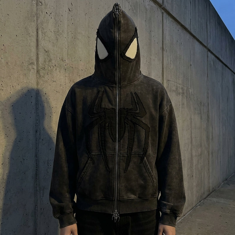 Arachne hoodie zipped fully over the face showing the spider eyes