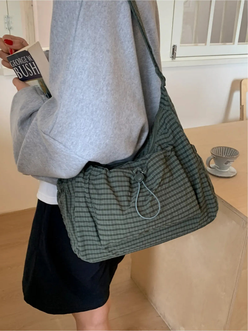 Sloane Plaid Crossbody Bag worn in green
