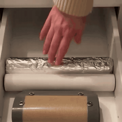 Rolling the mat and storing it beside the foil