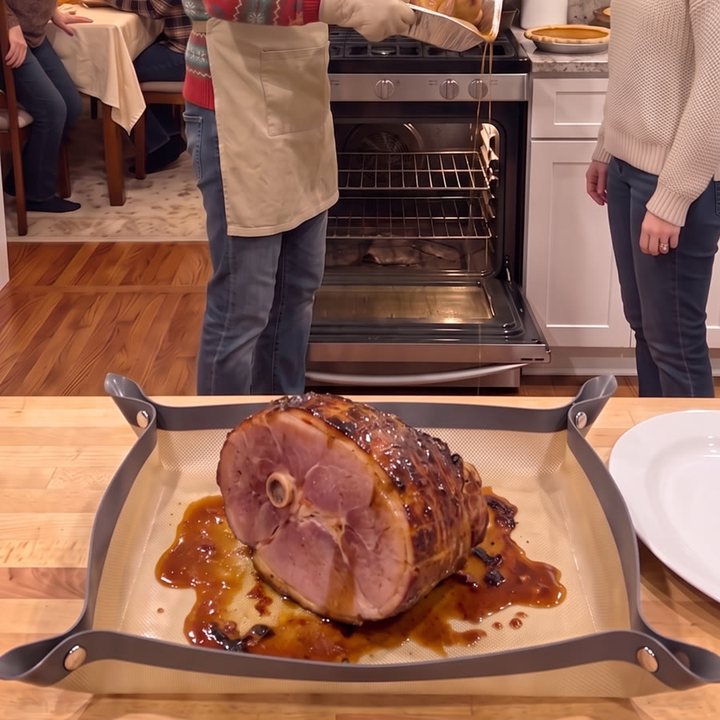 Glazed ham roasted in the snap tray on the kitchen counter